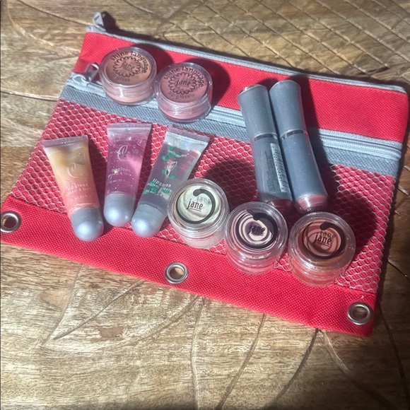 Red Cosmetic Travel zippered bag with a variety of Lipsticks and Lipglosses - Picture 1 of 2